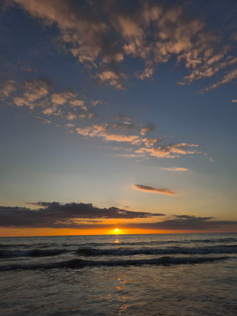Perfect sunset at Manzanillo Beach, lodging in Cóbano